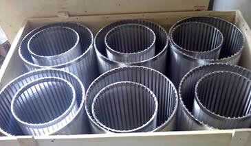 Many wedge wire filter elements packed in wooden cartons